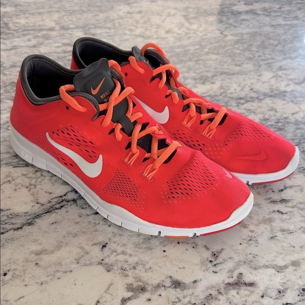 Women’s Bright Red and Orange Nike Sneakers